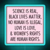 Activist-inspired neon sign promoting inclusivity and social justice values brightly.