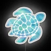 Vibrant digital art print of sea turtle in blue hues.