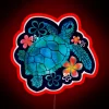 Glowing neon turtle amidst vibrant floral arrangement decorative wall art