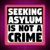 Advocating Refugee Rights with Bold Neon Sign Statement Illumination