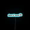 Add a pop of personality with this colorful neon sign.