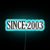 Neon Sign Reads Vintage Since 2003 in Bold Letters