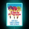 Vibrant RGB neon 'Singing in the Rain' musical quote decoration artwork