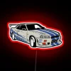 Add nostalgic flair with a Skyline-inspired neon racing memorabilia display.