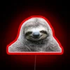 Vibrant smile from a happy sloth in colorful RGB glow.