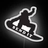 Add bold winter vibes with a snowboard send it neon sign.