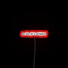 Neon sign featuring lyrics from The 1975's song 'So Far It's Alright'