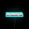 Multilingualism meets urgency in colorful So Many Languages neon art piece.