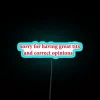 Neon Sign Art Humorously Mocks Common Criticisms and Stereotypes with Tolerance.
