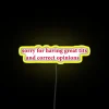 Colorful RGB LED art display with humorous quote about opinions