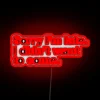 Apologizing with sass: 'Sorry I'm late, I didn't wanna come' neon sign.