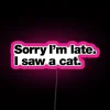 Vibrant RGB neon sign with humorous pet owner apology message