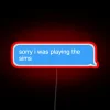 Neon RGB Sign says "Sorry I'm Playing The Sims" Humorously