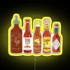 RGB LED Neon Sign in Black Background with Hot Sauce Design