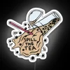 Neon sign reading 'Spill the Tea' in bold RGB letters