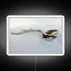 Modern kitchen decor with silver spoon inspired neon light art