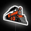 Vintage train locomotive mascot neon sign with colorful glowing accents.