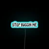 Neon warning sign says stop annoying me in colorful letters