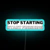 Neon Quote Sign Motivates Agile Productivity with Finish What You Start