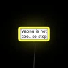 Anti-vaping awareness message warning kids with colorful glowing neon lights.