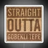 Vibrant Neon Sign Depicting Ancient Megalithic Mural at Göbekli Tepe