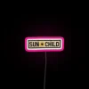 Vibrant, colorful neon sign featuring child-like sun in RGB hues.