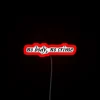 Radiant Taylor Swift Evermore lyrics illuminated in vibrant color-changing neon