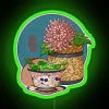 Vintage-inspired neon sign featuring a tea cup and chrysanthemum flowers.
