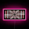 Electric vehicle enthusiast's dream: vibrant Tesla Plaid badge glowing neon sign.