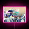 Vibrant, customizable RGB LED sign recreating The Great Wave's essence.