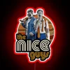 Illuminated "The Nice Guys" logo in vibrant RGB neon glow.