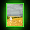 Retro-Futuristic Neon Sign with Ghostly Wheat Field Whimsical Accent Wall