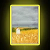 Whimsical RGB Neon Sign Featuring a Ghostly Figure in Field Scene
