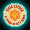 Whimsical driver-themed neon LED light decoration for car enthusiast interior spaces.