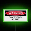 Neon toolbox decoration with colorful lights and humorous occupation options.
