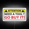 Vibrant Neon Sign for Tool Enthusiasts and Construction Professionals Office Space.
