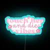 Vibrant pink neon sign with flower and star designs shining