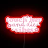 Vibrant pink glow of flowers and stars on die sign