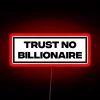Sarcastic office decor warning of corporate greed and deception