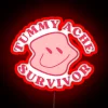 Room decor neon sign for tummy ache survivors and warriors.