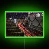 Modern highway-inspired neon sign with vibrant RGB light trails effect