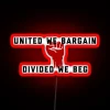 Worker solidarity in action, illuminated with vibrant neon glow accents.
