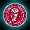 UW Madison circle logo illuminated with vibrant red blue green neon light.