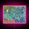 Vibrant neon art tribute to Van Gogh's iconic blooming Irises