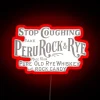 Retro Peruvian Whiskey Bar Decor with Edgy Neon Accent Lighting