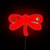 Whimsical retro dragonfly neon art decor for bohemian inspired spaces.