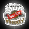 Neon bar decor featuring vintage whiskey bottle and rye spirit