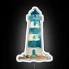 Add vibrant waterfront charm with this glowing watercolor lighthouse