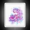 Add a touch of whimsy with this colorful neon sign.