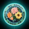Mindful quotes inspired wall decor with colorful neon repair reminder